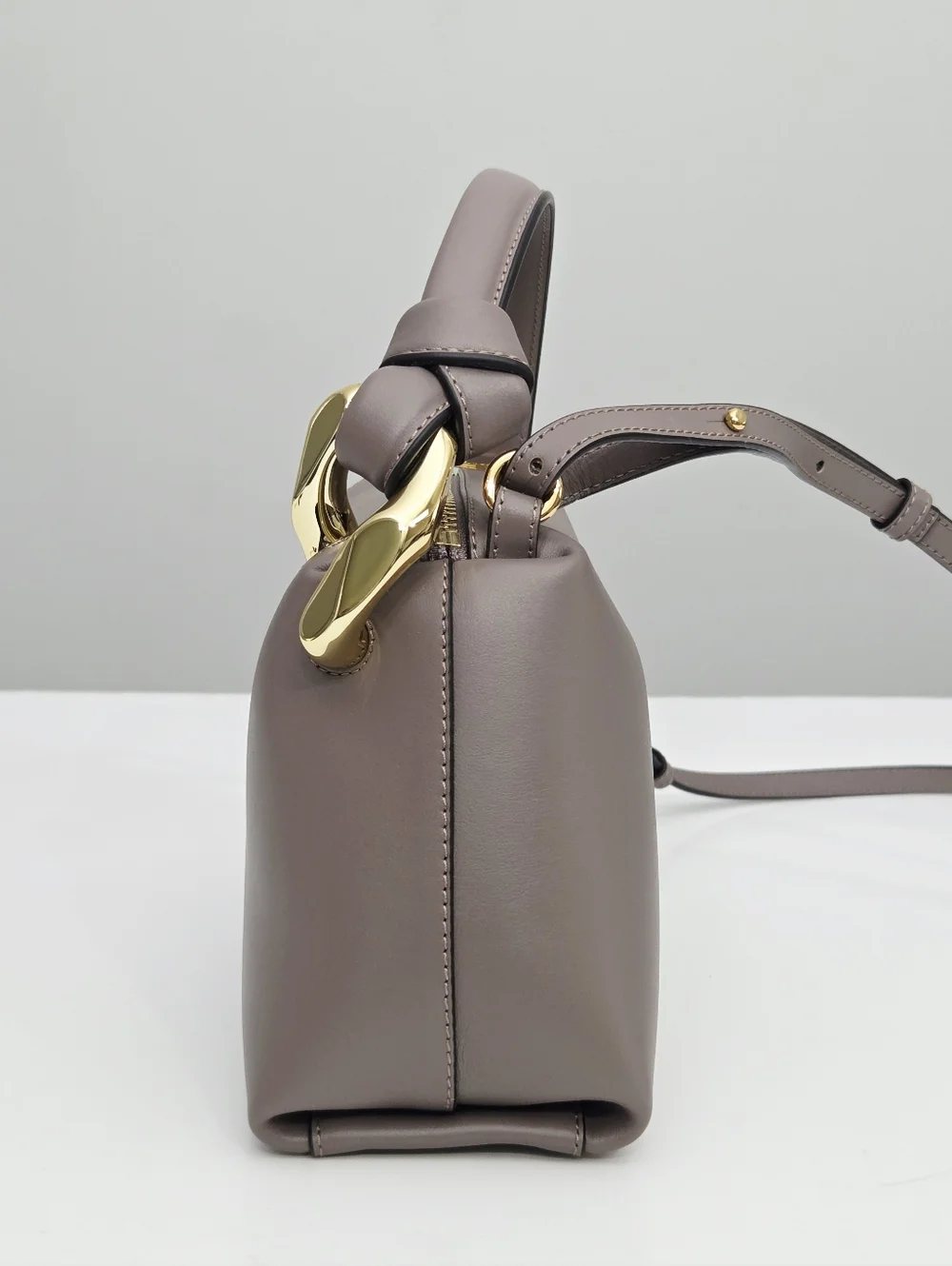 JW ANDERSON THE JWA SMALL CORNER BAG - TAUPE LEATHER
